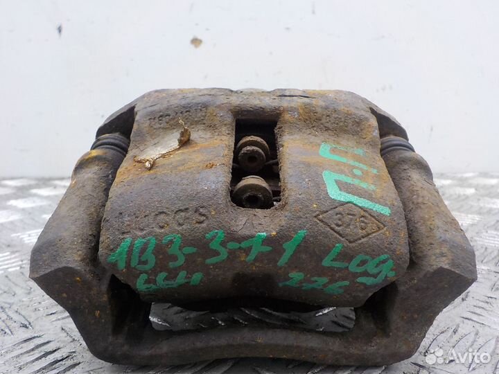 Суппорт тормозной передний правый Renault Logan 20