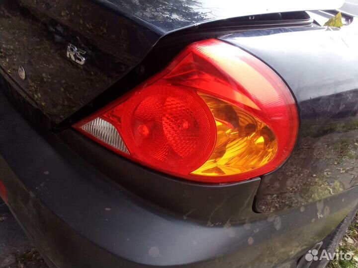 Kia spectra фонарь левый оригинал