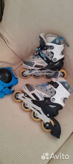 Роликовые коньки