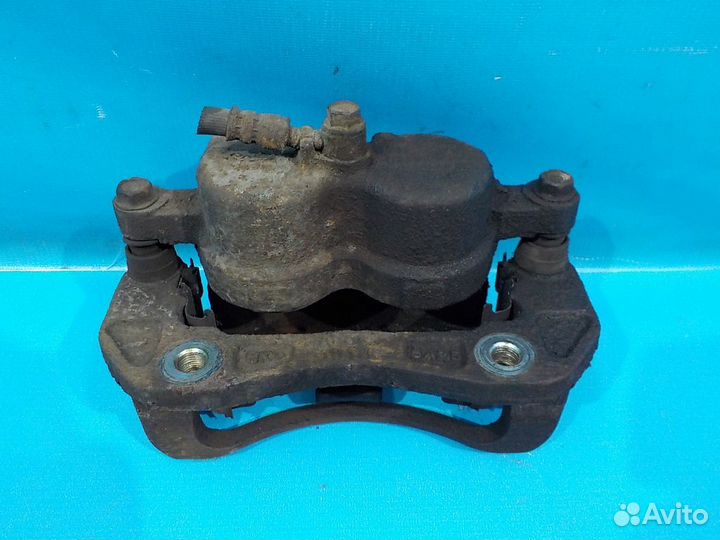 Тормозной суппорт передний левый KIA Sorento 1 200