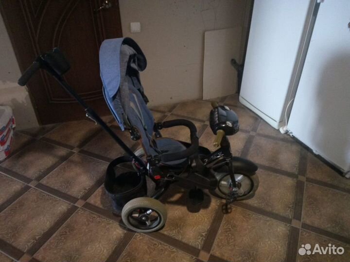 Детский трехколесный велосипед коляска