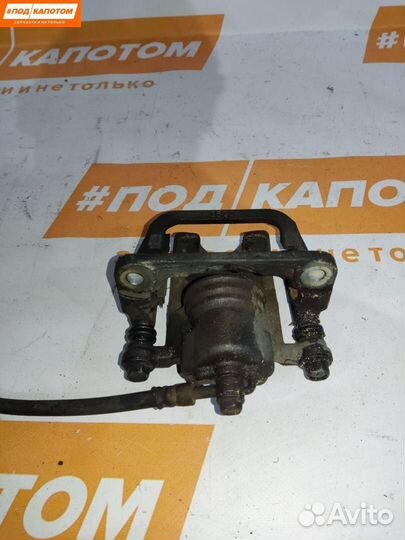 Суппорт тормозной задний левый Nissan X-Trail T31