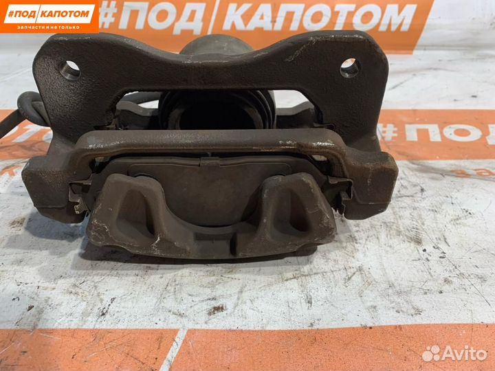 Суппорт тормозной передний правый Toyota Camry