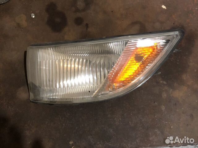 Поворотники левый Mitsubishi Lancer