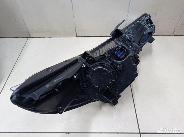 Фара передняя левая с электрокорректором