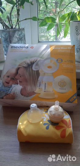 Медела Молокоотсос электронный Swing Maxi Flex