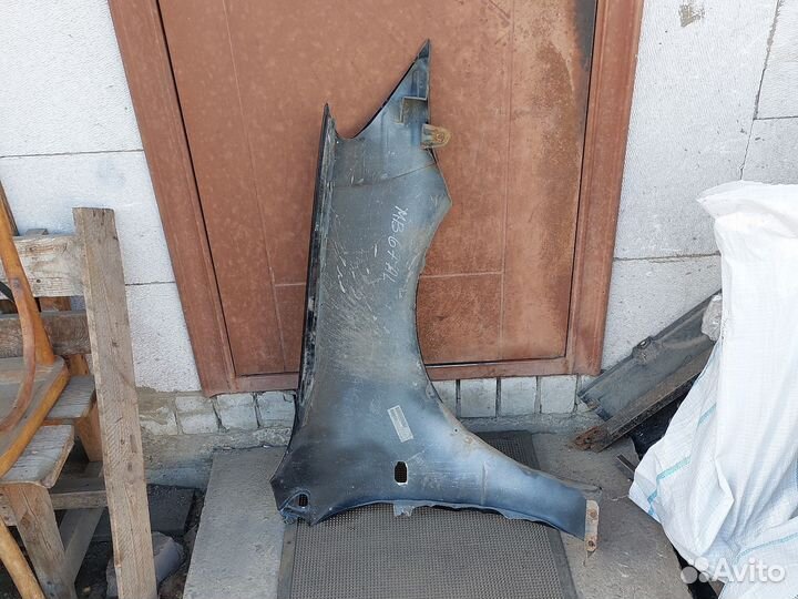 Митсубиси Лансер 9 крыло переднее левое MN150625