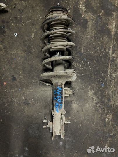 Амортизатор передний левый