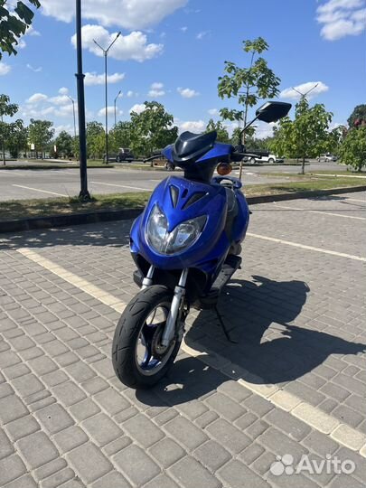 Скутер омакс