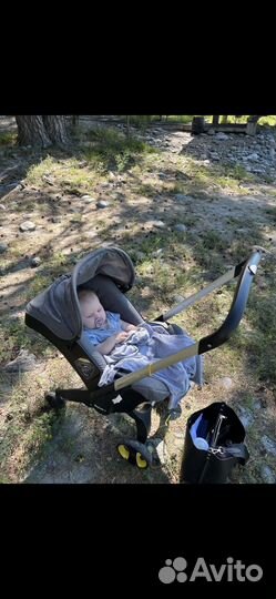 Коляска автокресло doona с базой isofix