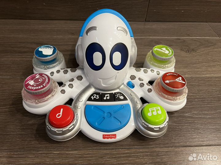 Продам музыкальную игрушку осьминог fisher price