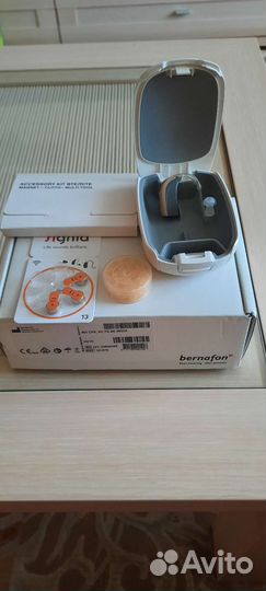 Заушный слуховой аппарат