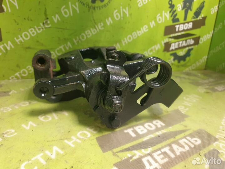 Суппорт со скобой задний левый Kia Rio 3 Solaris