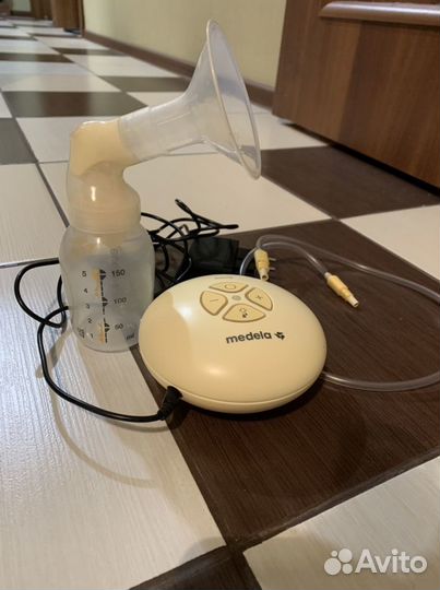 Молокоотсос medela swing электрический