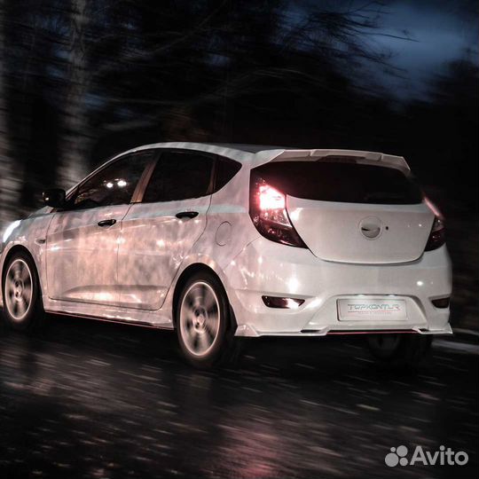 Сплиттер заднего бампера Hyundai Solaris хэтчбэк