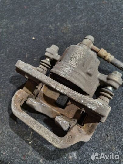 Суппорт тормозной задний правый Nissan X-Trail T31