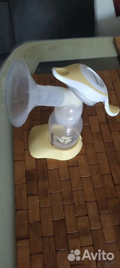 Молокоотсос medela ручной