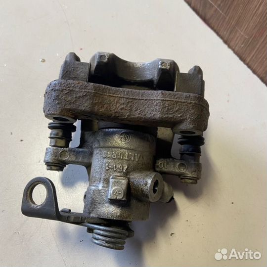 Суппорт задний правый Peugeot 308 T7 EP6