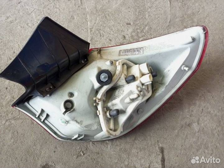 Фонарь задний левый Opel Astra 1222087 J