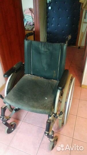 Инвалидное кресло