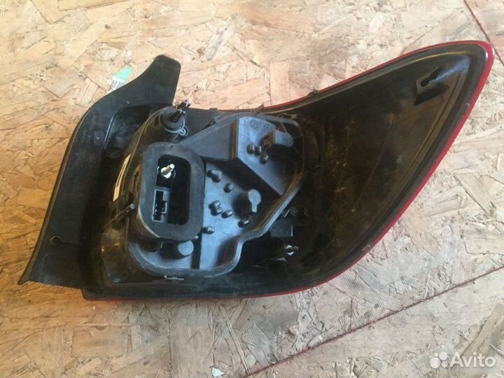 Фонарь задний левый Renault Logan