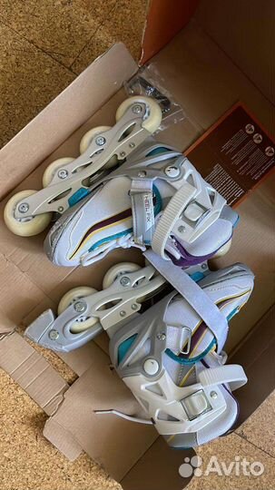 Роликовые коньки