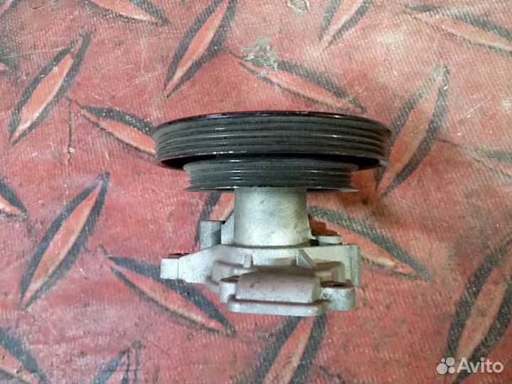 Насос водяной Hyundai Tucson 1