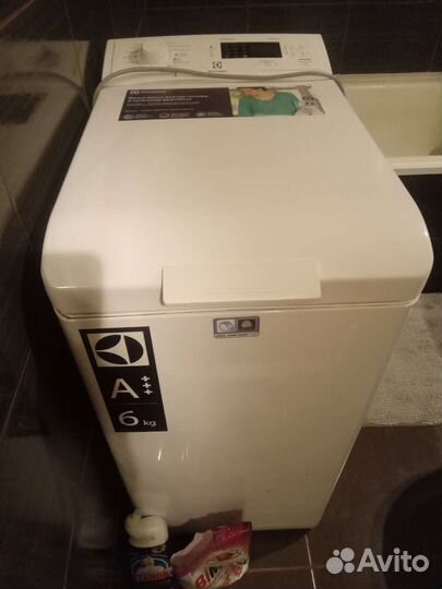 Стиральная машина с вертикальной загрузкой