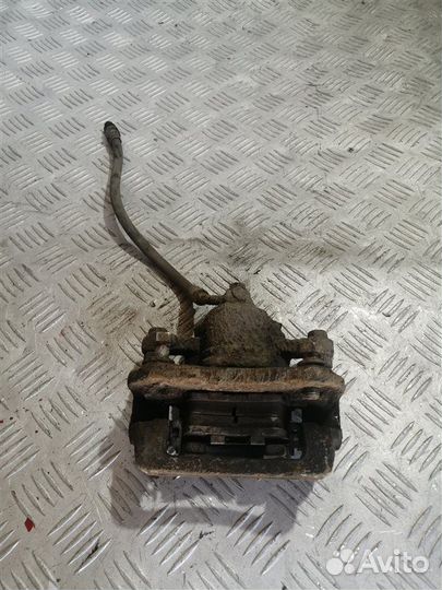 Суппорт тормозной задний левый Ssangyong Actyon