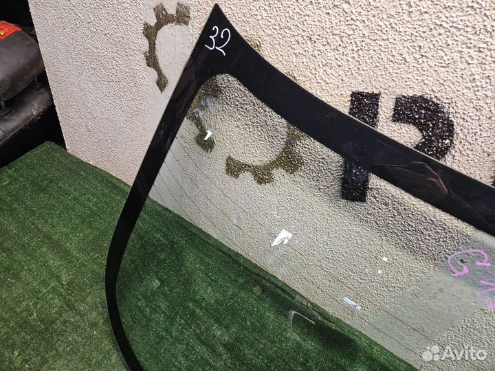 Стекло заднее на Almera G15