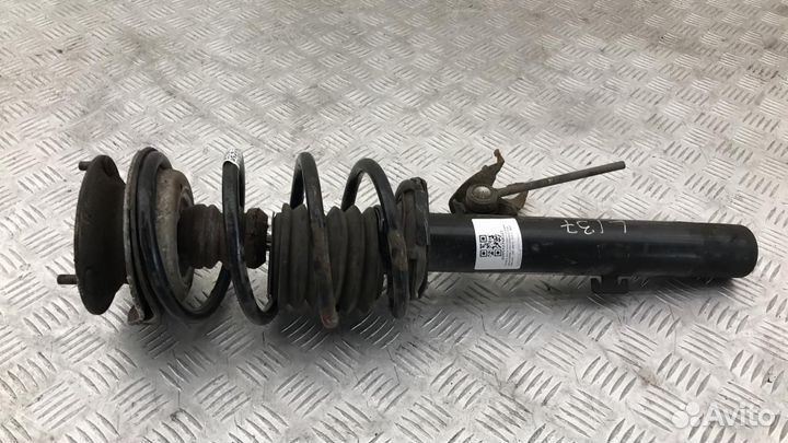 Стойка амортизатора передняя левая BMW 3