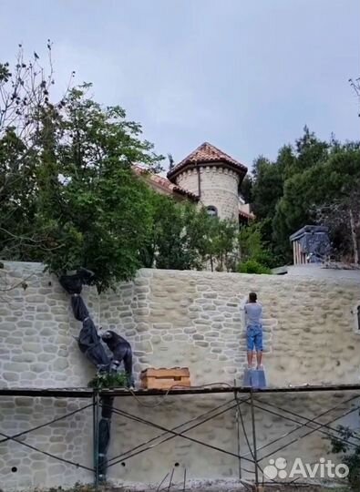 Декоративная штукатурка фасада под камень