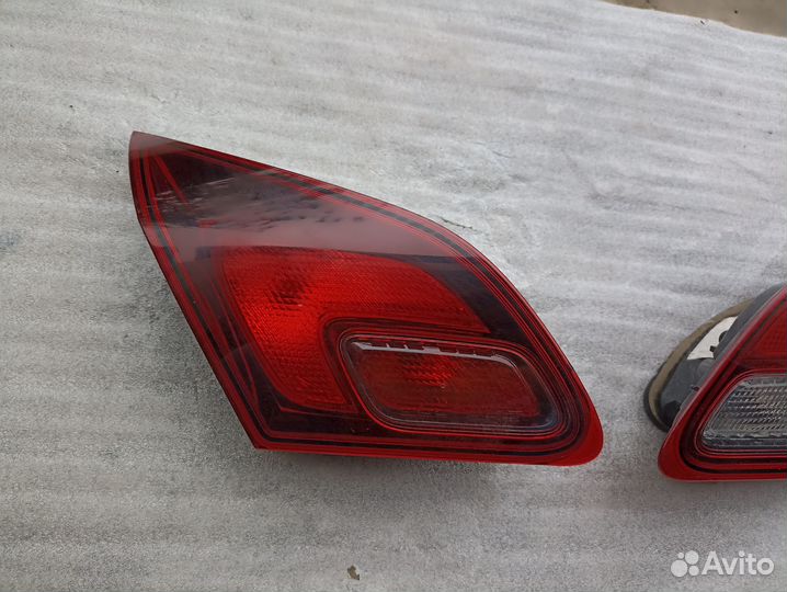 Фонарь в крышку багажника Opel Astra J 2009-2016