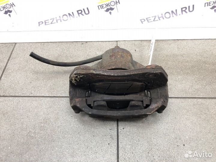 Суппорт тормозной передний правый Kia Ceed хэтчбек