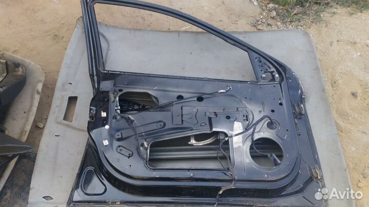 Дверь для Opel Astra H 2004-2015