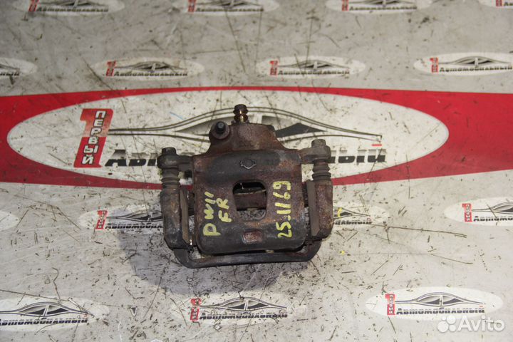 Суппорт перед право c Nissan Cefiro A32 VQ20DE