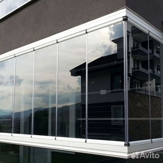 Безрамное раздвижное остекление