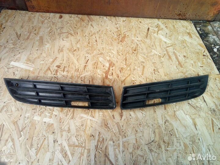 Заглушка противотуманки Vw Passat B6