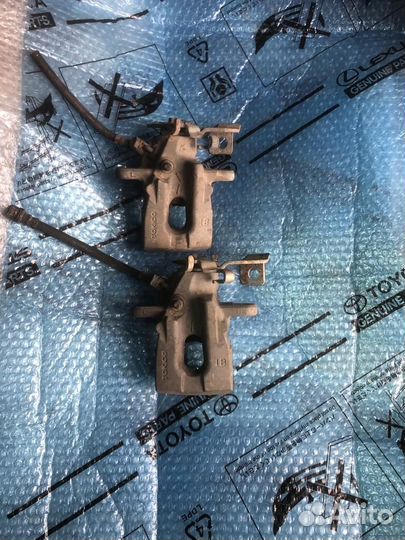 Суппорт тормозного диска corolla150