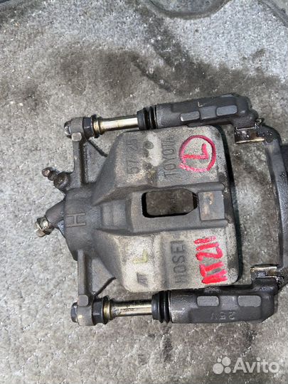 Суппорта AT211 toyota caldina carina corona