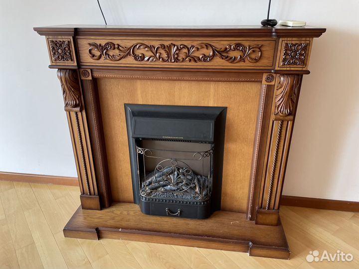 Электрический камин с деревянным порталом