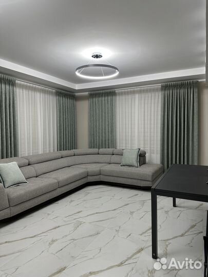 Шторы в гостиную на два окна и дверь