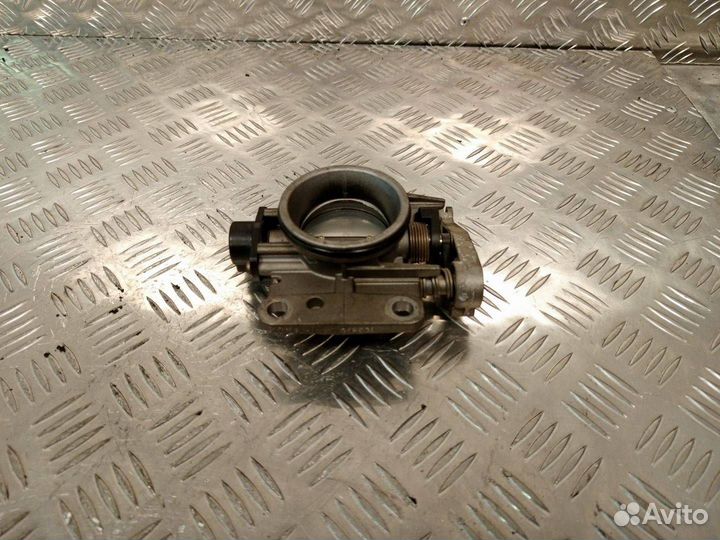 Дроссельная заслонка Renault Logan 7700875435