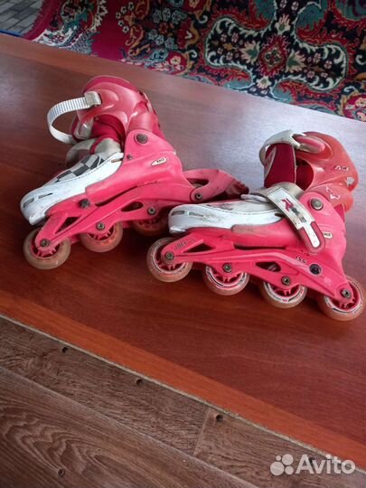 Роликовые коньки