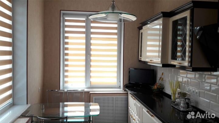 Рулонная штора на окно