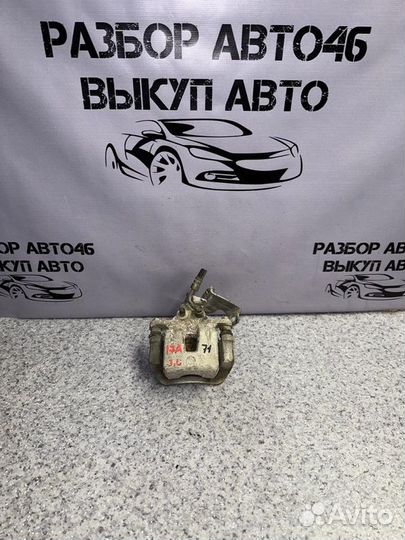 Суппорт задний левый Kia Cerato BD