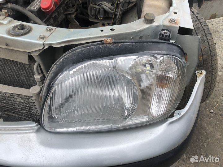 Фара левая nissan march k11