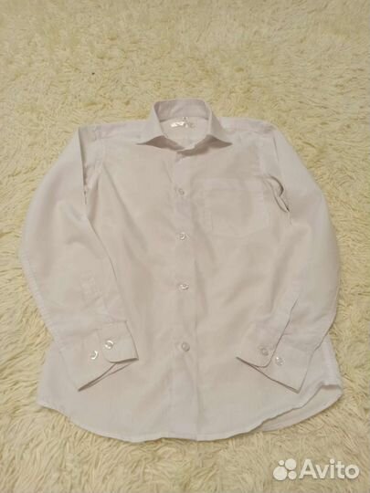Рубашка в отличном состоянии, размер 140