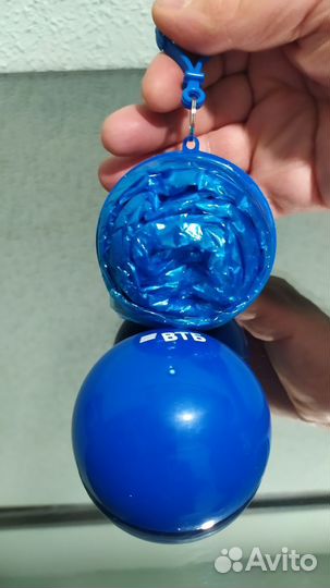 Компактный дождевик в пластиковом шаре