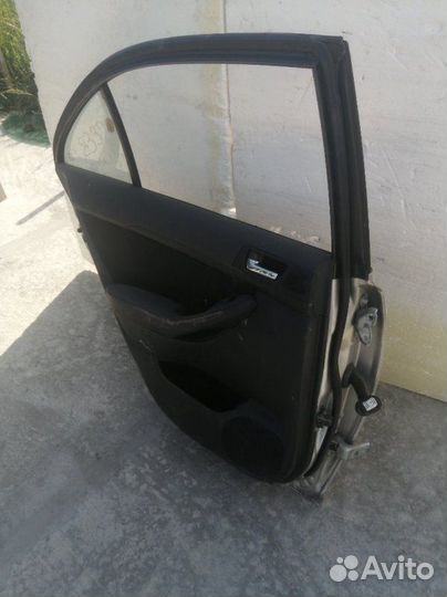 Дверь задняя левая Toyota Avensis AZT250